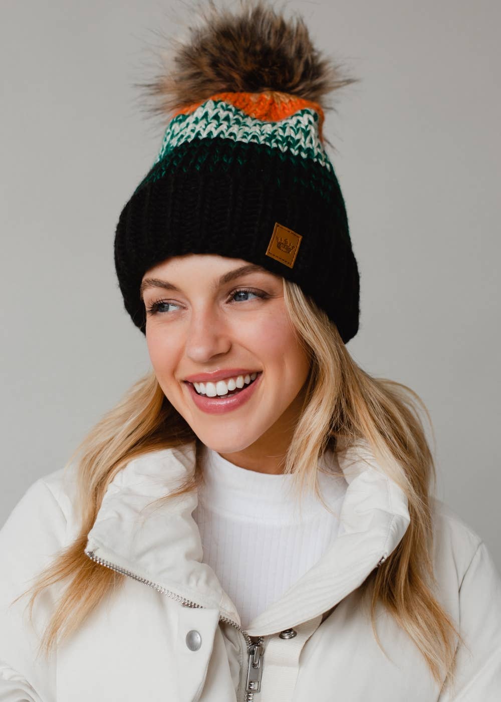 Panache Apparel Co. - Black, Green & Orange Patterned Pom Hat